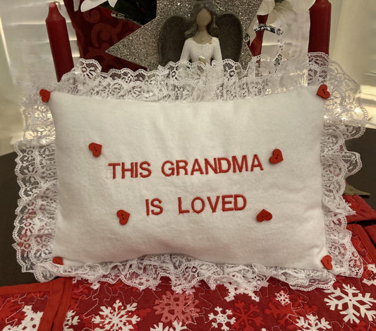 Grandma pillow embroidered in red