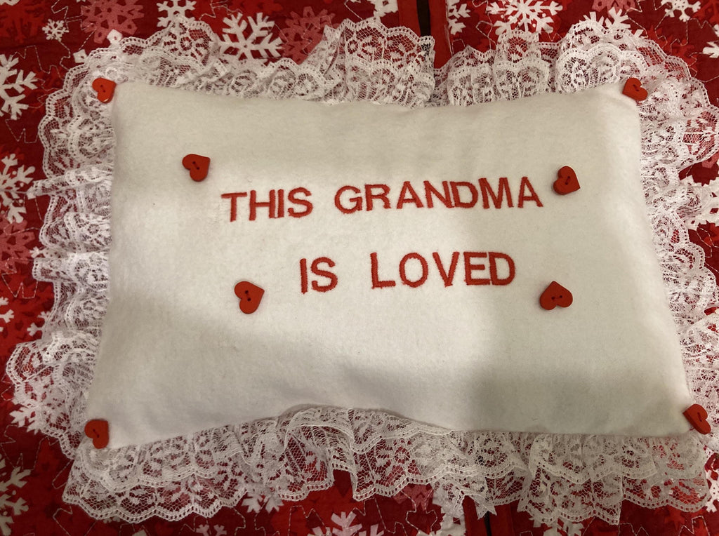 Grandma pillow embroidered in red