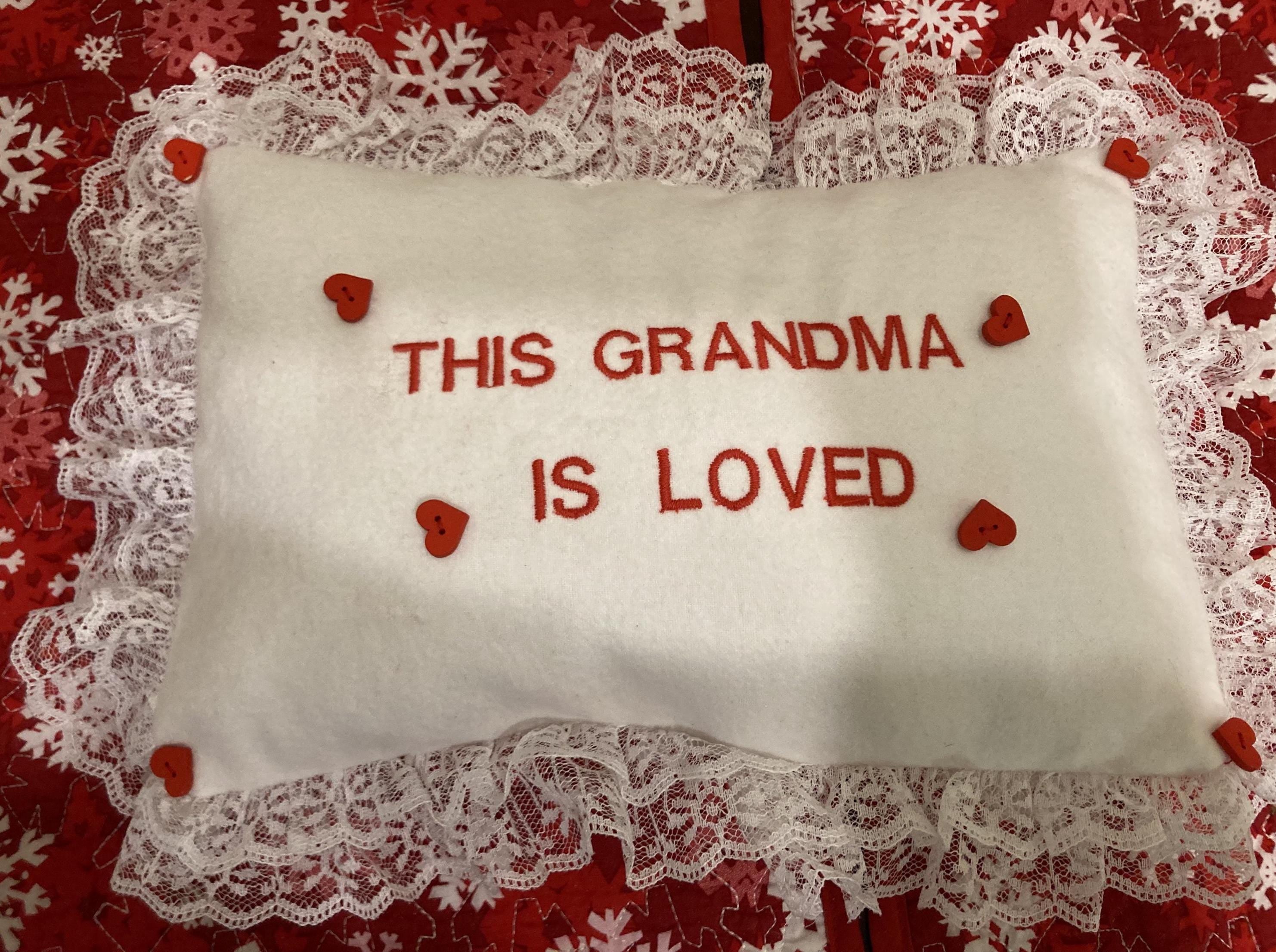 Grandma pillow embroidered in red