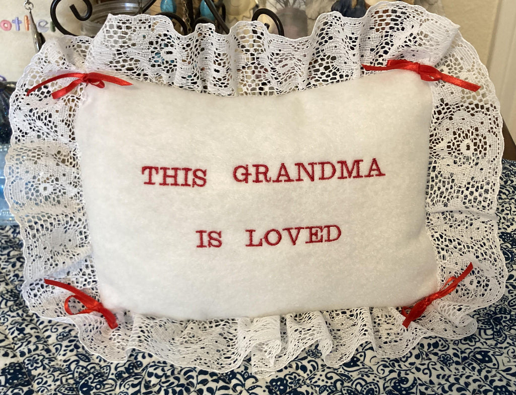 Grandma pillow embroidered in red