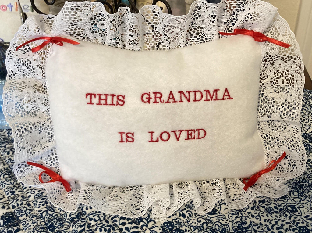 Grandma pillow embroidered in red