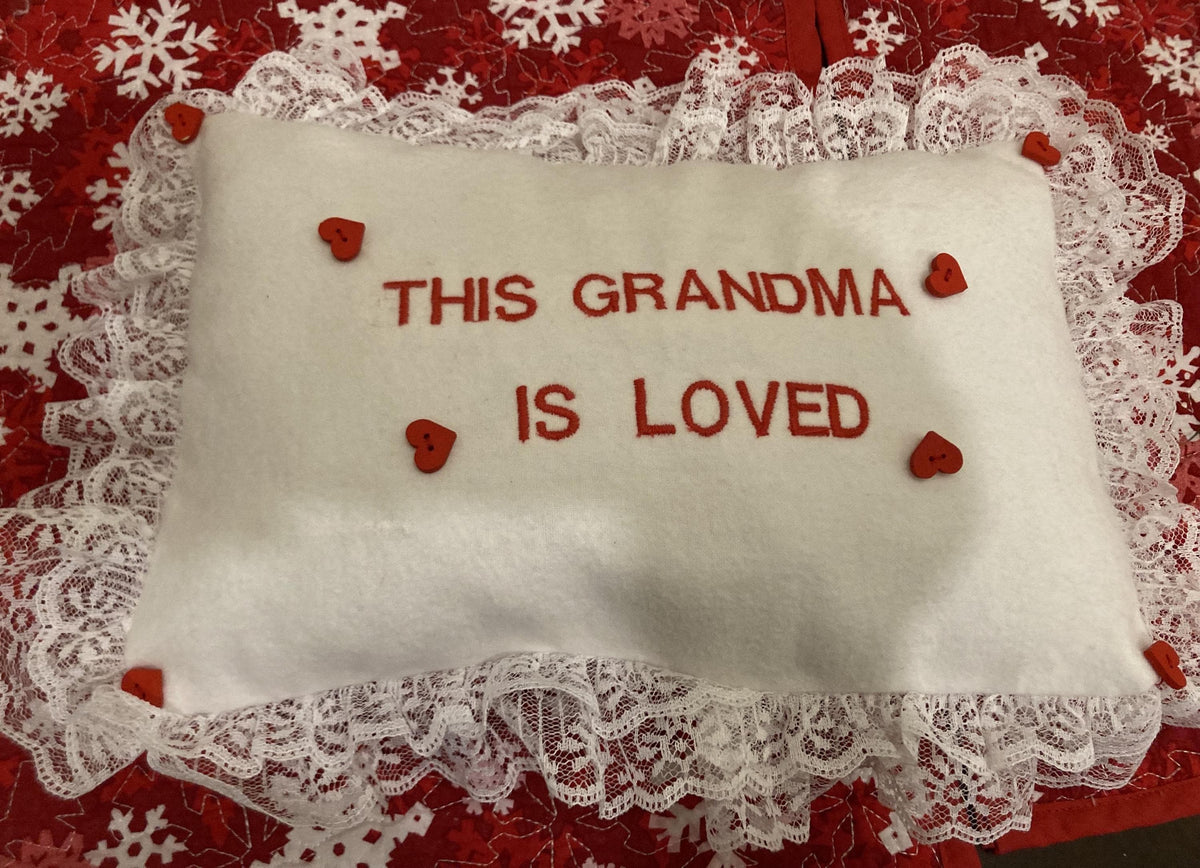 Grandma pillow embroidered in red