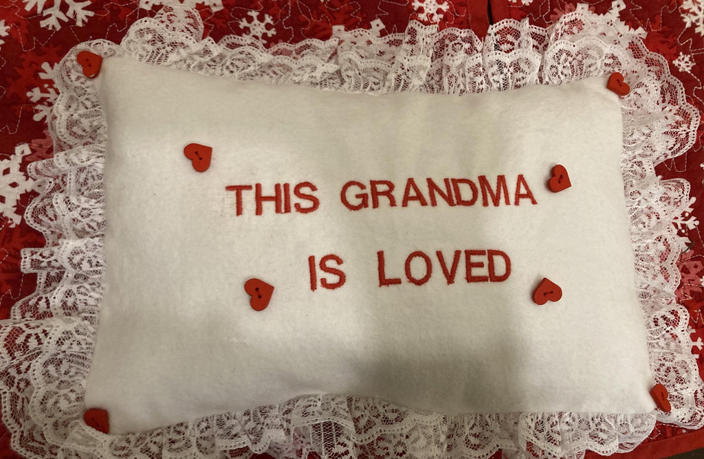 Grandma pillow embroidered in red
