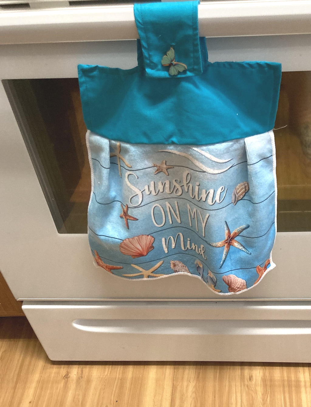 HELLO SUMMER! at the beach or ocean hanging towels