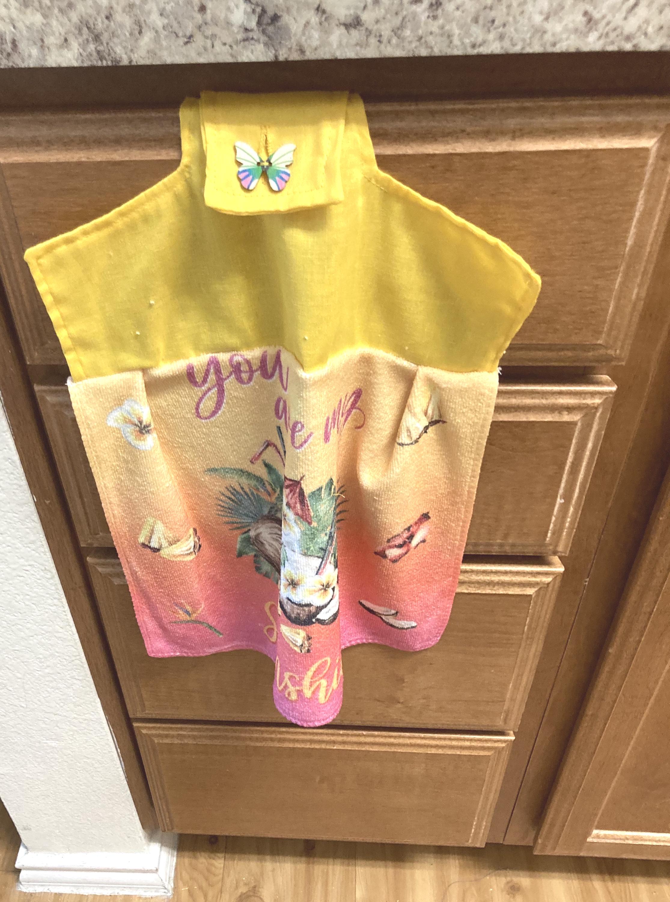SUMMERTIME food and drinks pictured on hanging towels