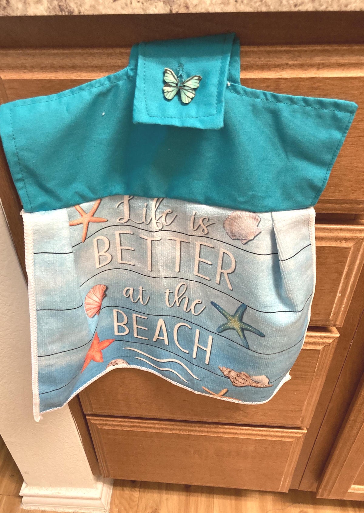 HELLO SUMMER! at the beach or ocean hanging towels