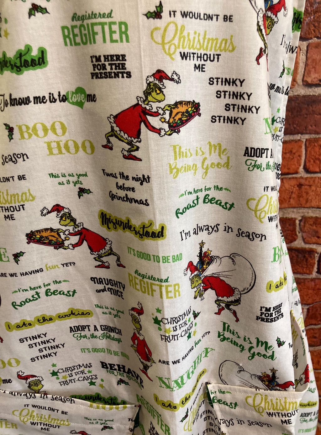 GRINCH CHRISTMAS SAYINGS on Reversible Cross Back Apron