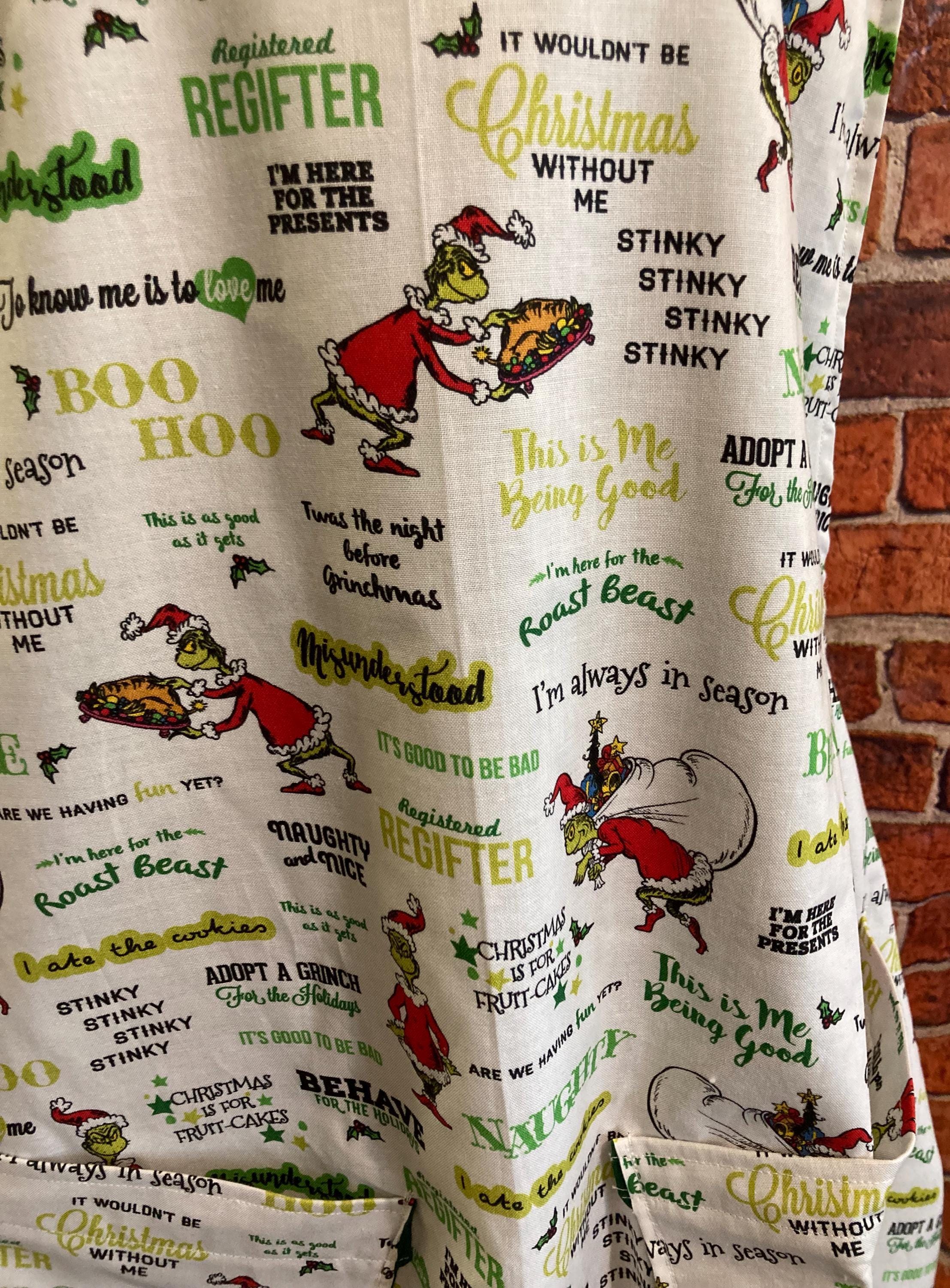 GRINCH CHRISTMAS SAYINGS on Reversible Cross Back Apron