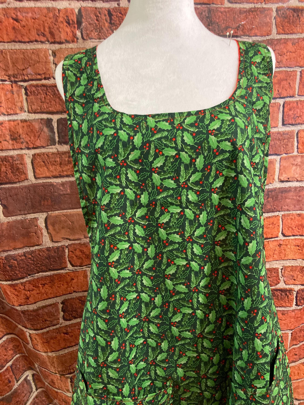 HOLLY LEAVES BERRIES Green and red on a reversible cross back apron