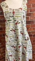 GRINCH CHRISTMAS SAYINGS on Reversible Cross Back Apron