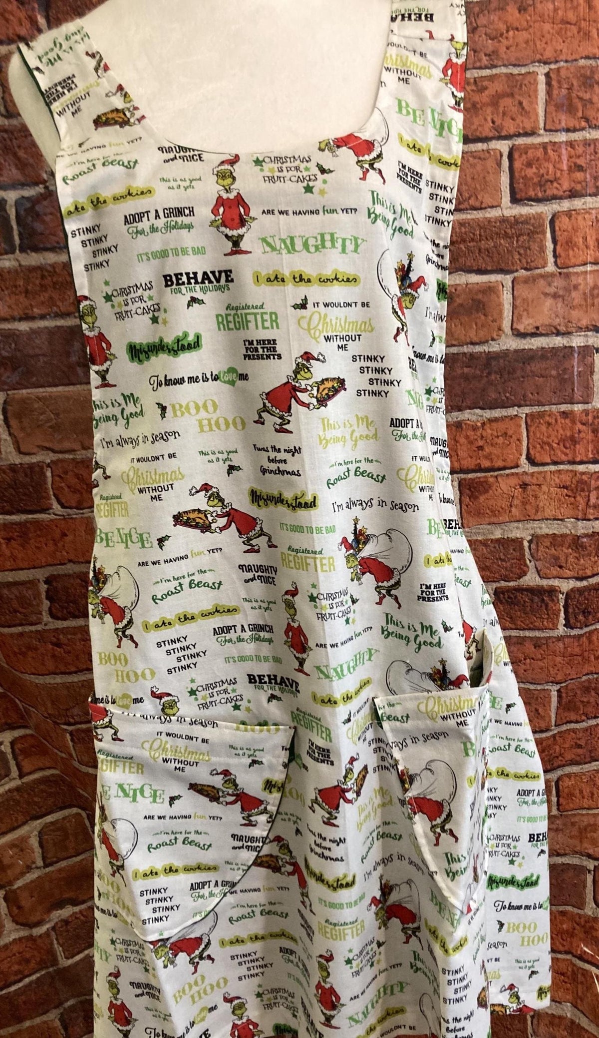 GRINCH CHRISTMAS SAYINGS on Reversible Cross Back Apron