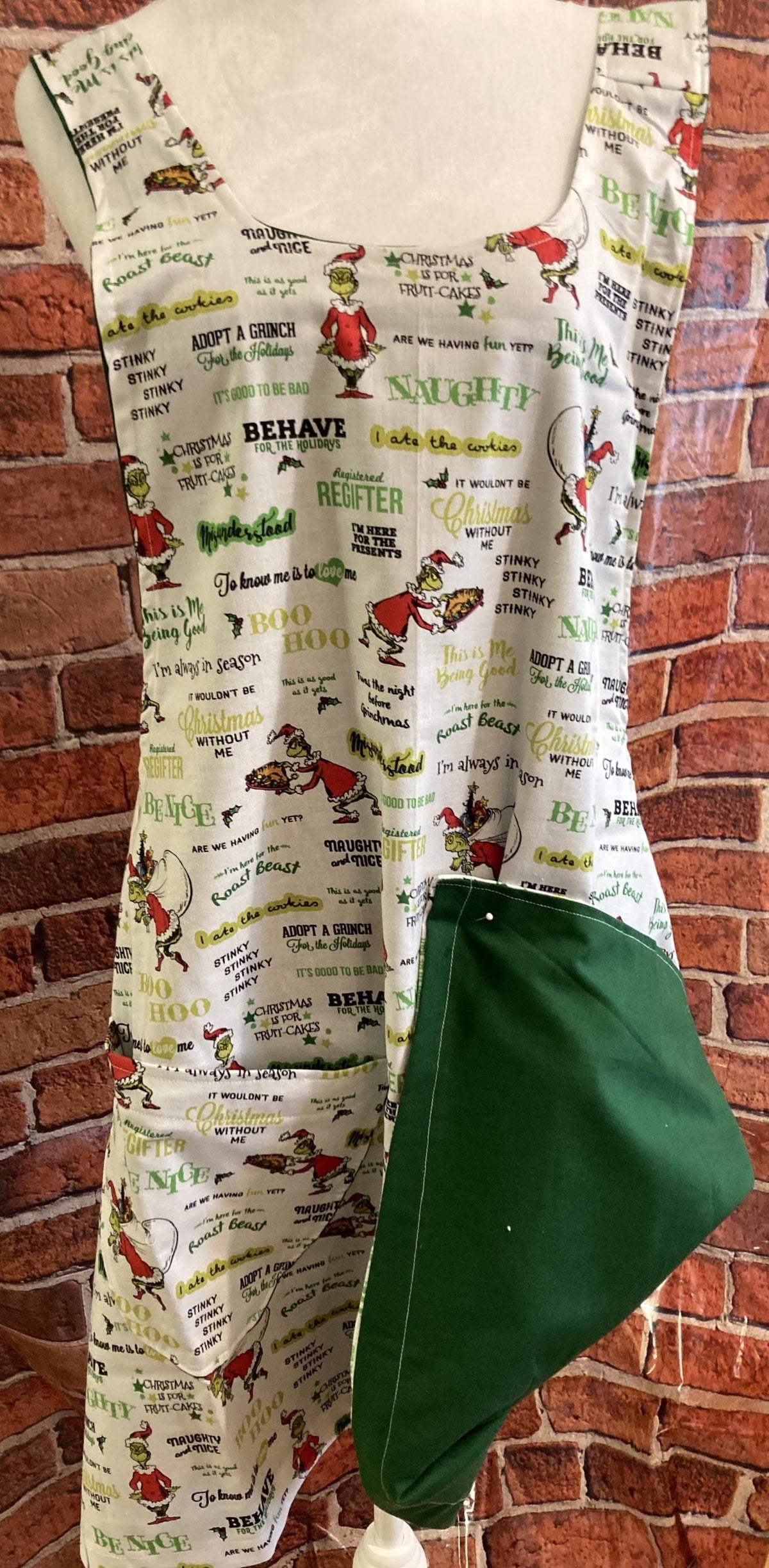 GRINCH CHRISTMAS SAYINGS on Reversible Cross Back Apron