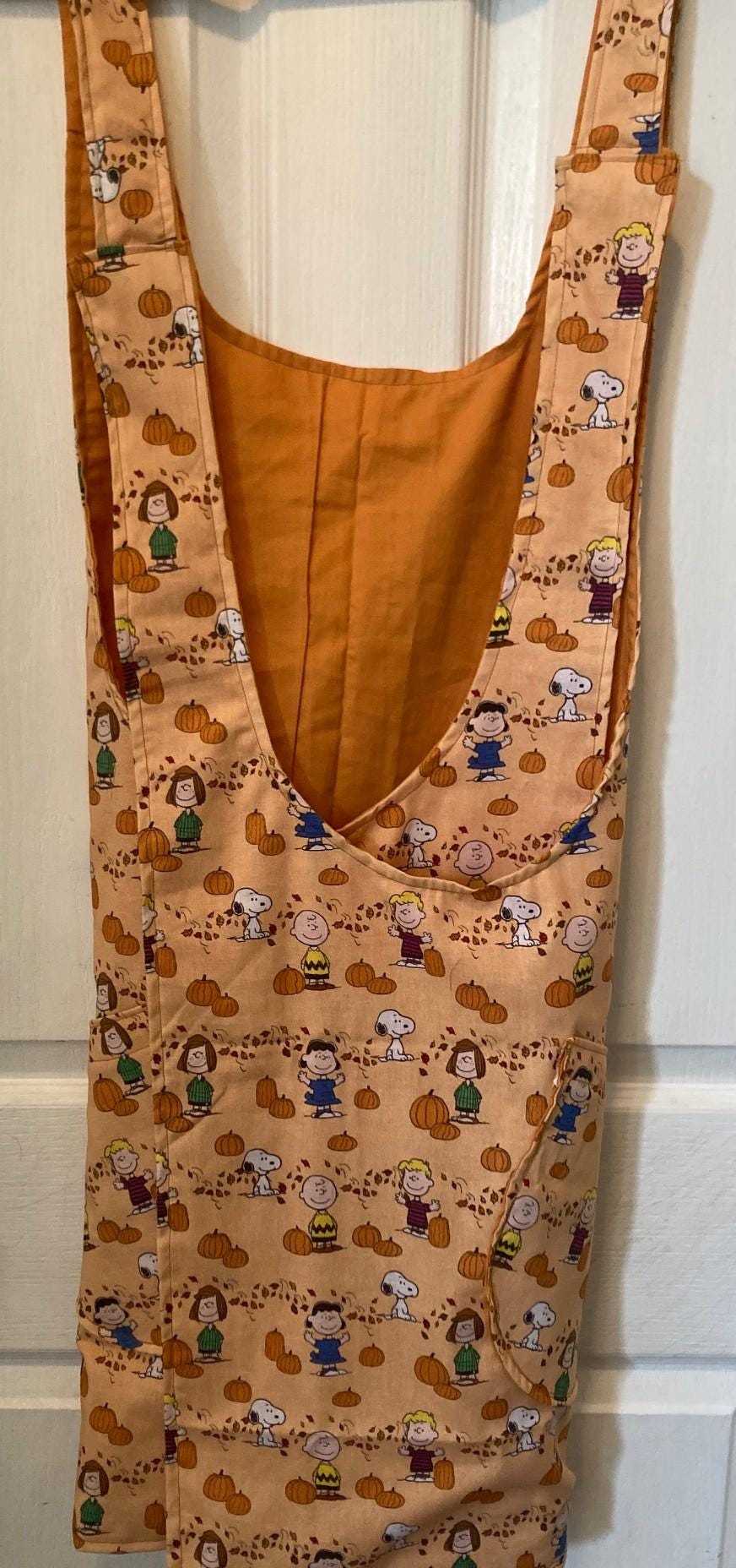 Peanuts Harvest Reversible Cross back Apron, Pumpkins colored, Pockets, Kitchen Wear