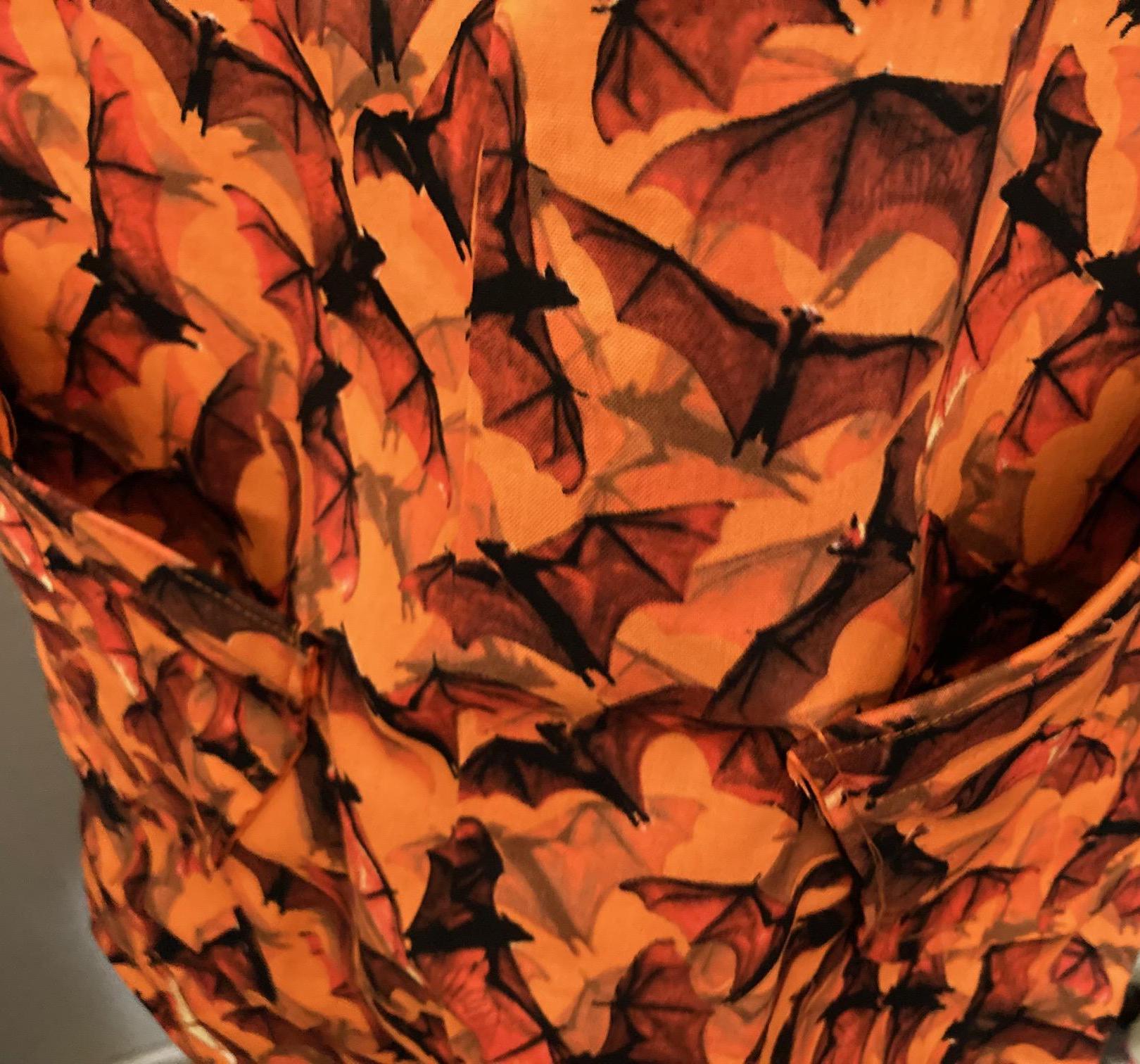 Flying Bats Halloween Apron: Reversible Cross Back Orange Sky Design