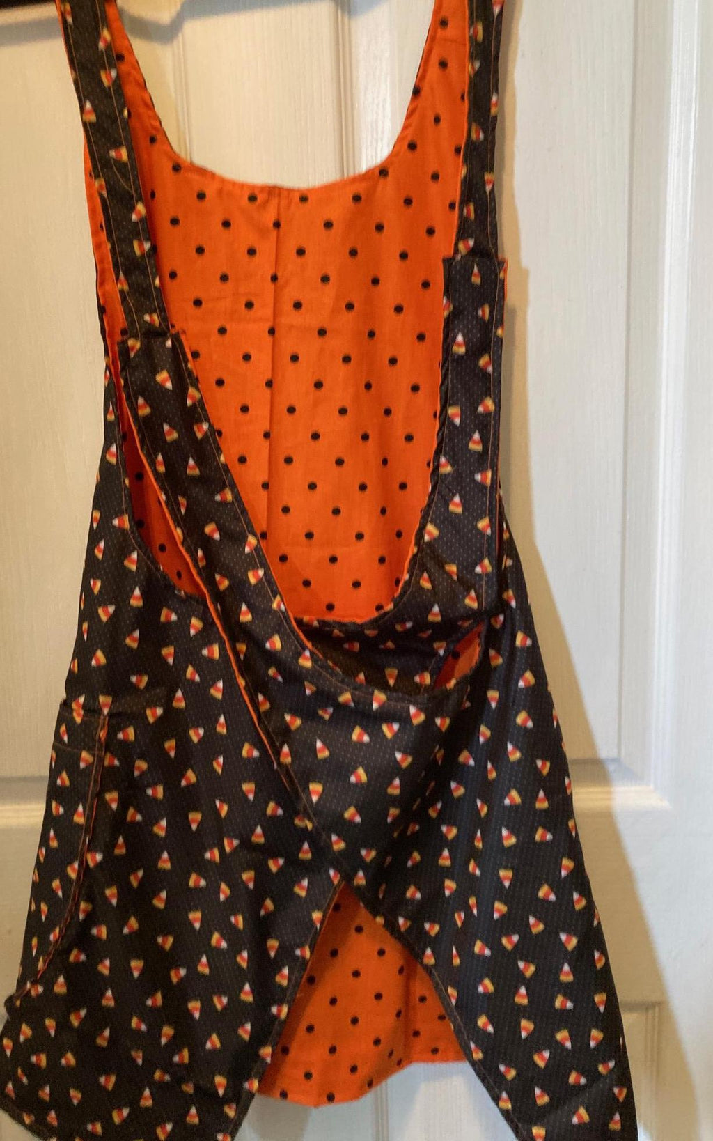 Halloween Candy Corn and Black Dots on Orange Reversible Cross Back Apron