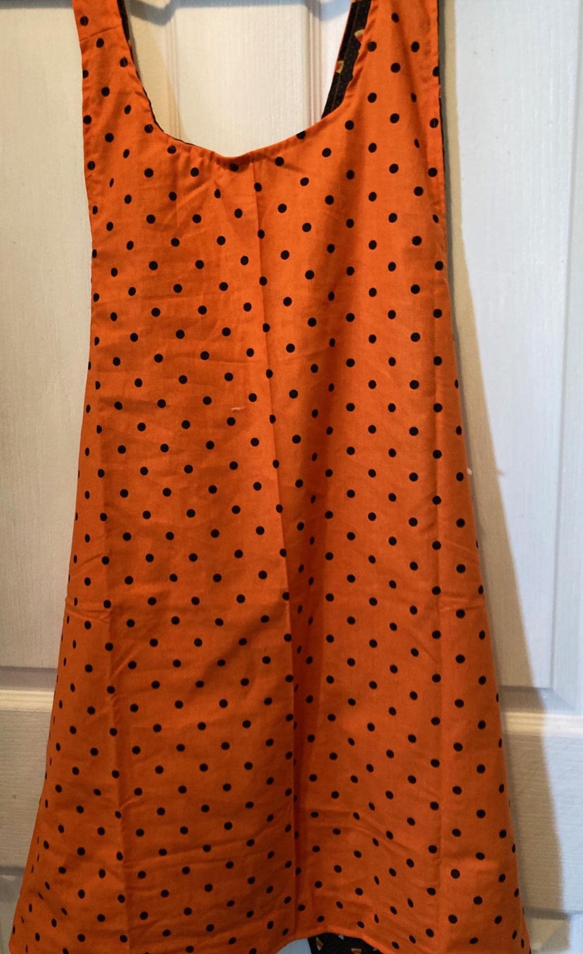 Halloween Candy Corn and Black Dots on Orange Reversible Cross Back Apron