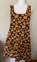 HALLOWEEN PUMPKINS Scattered on black fabric reversible cross back apron
