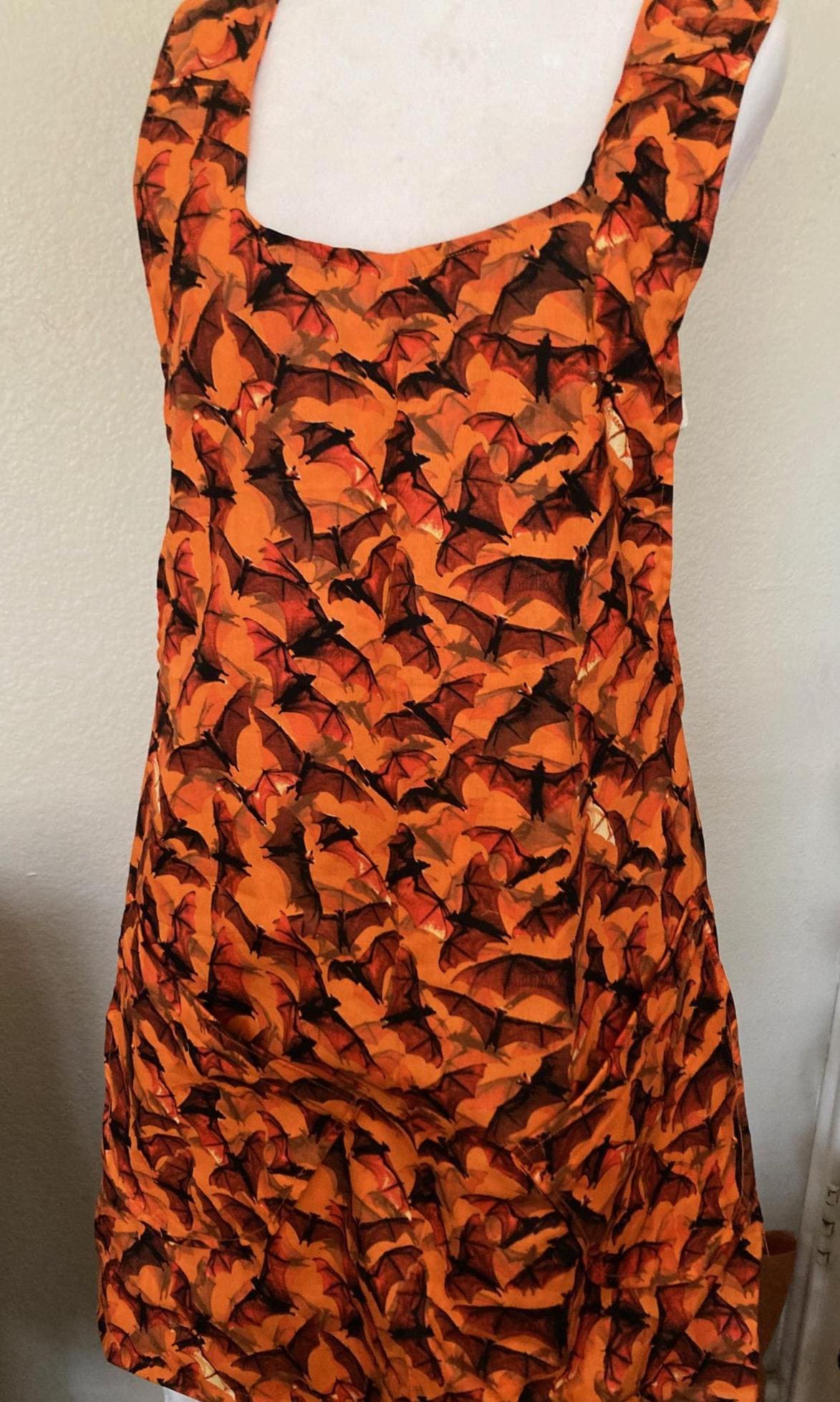 Flying Bats Halloween Apron: Reversible Cross Back Orange Sky Design