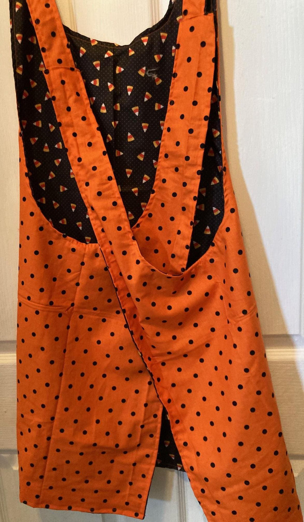 Halloween Candy Corn and Black Dots on Orange Reversible Cross Back Apron