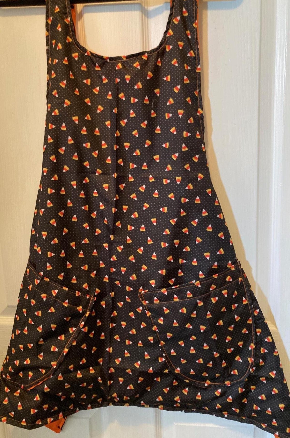 Halloween Candy Corn and Black Dots on Orange Reversible Cross Back Apron