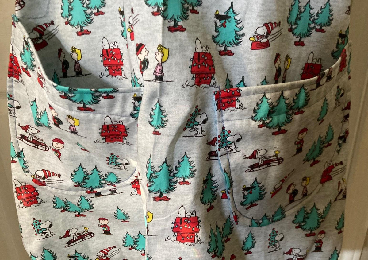 Snoopy's Snowy Christmas Day on a Reversible Cross Back Apron