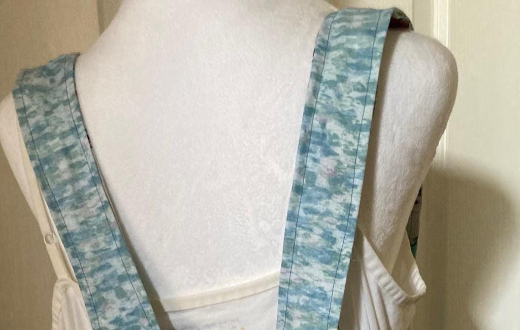 Snoopy's Snowy Christmas Day on a Reversible Cross Back Apron