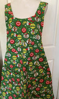 The Grinch Is in the House, Handmade reversible cross back apron, Yellow Grinch balloons,