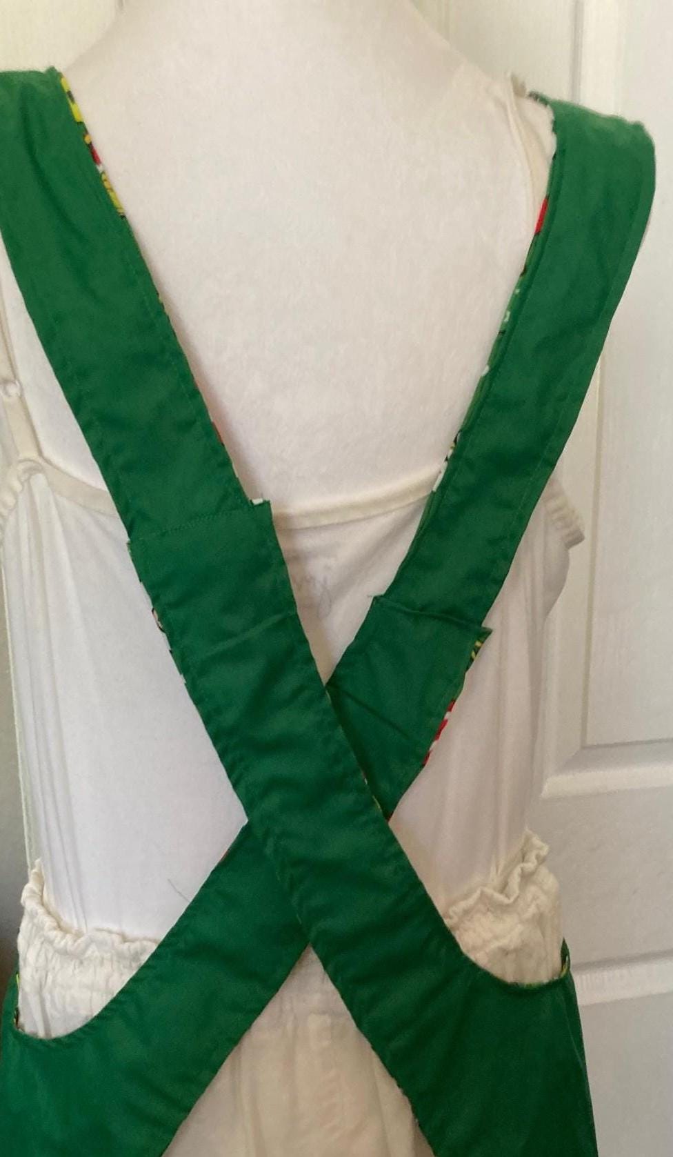 The Grinch Is in the House, Handmade reversible cross back apron, Yellow Grinch balloons,